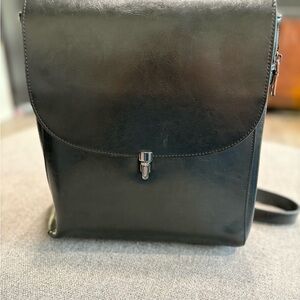 Sleek Black Leather Backpack with Modern Design
